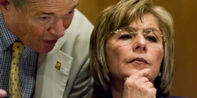 Sen. Barbara Boxer is shown here, alongside Sen. Kit Bond, at a committee hearing on Capitol Hill July 21. (AP Photo)