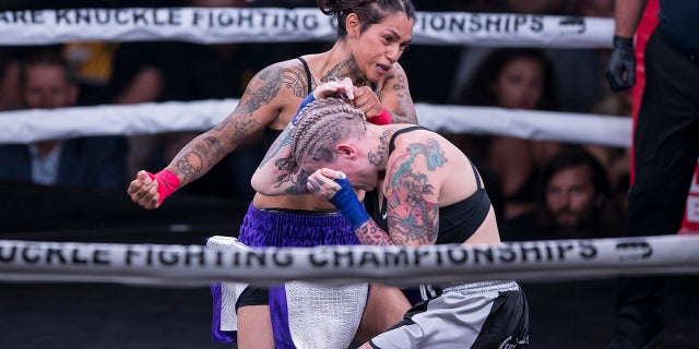 Alma Garcia, left, is seen fighting Bec Rawlings in the only women's fight. Rawlings ultimately won their bout with a TKO.