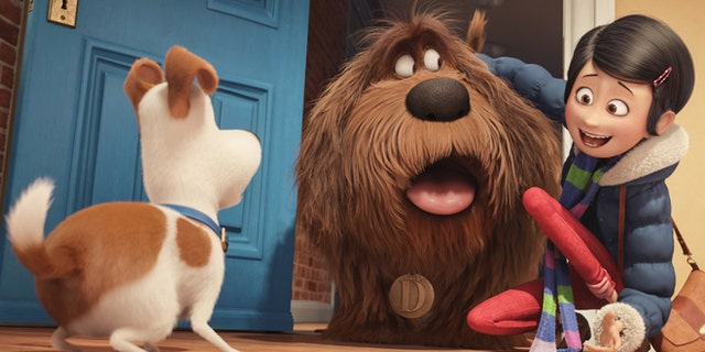 In this image released by Universal Pictures, from left, characters Max, voiced by Louis C.K., Duke, voiced by Eric Stonestreet, and Katie, voiced by Ellie Kemper, appear in a scene from, "The Secret Lives of Pets." (Illumination Entertainment and Universal Pictures via AP)