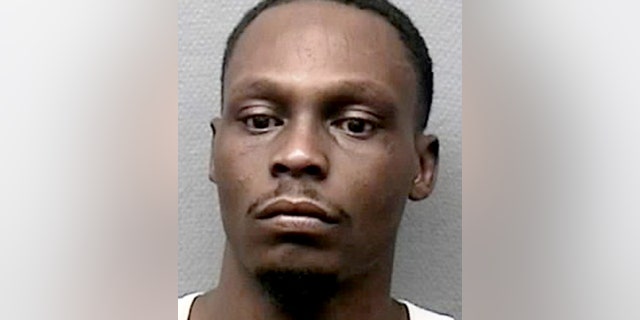 Che Lajuan Calhoun is shown in this undated photo provided by the Houston Police Department. Calhoun was arrested Wednesday in the fatal stabbing of 11-year-old Josue Flores, who was attacked as he walked home from school Tuesday.
