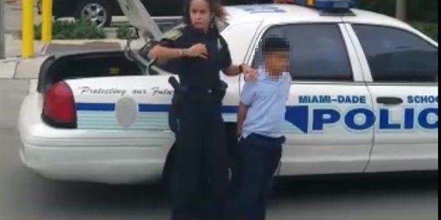 boy handcuffs