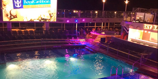 This Thursday, June 30, 2016, photo shows a pool on a Royal Caribbean cruise ship which a child fell into. The U.S. Coast Guard said the boy who fell into the pool on the cruise ship off the coast of New Jersey and nearly drowned is in critical condition. (Jacob Triplett via AP)