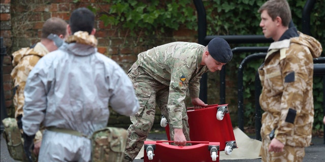Military personnel outside Bourne Hill police station in Salisbury, England, as police and members of the armed forces probe the suspected nerve agent attack on a former Russian spy.