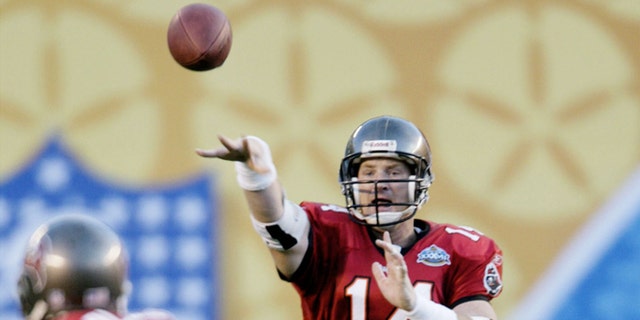 Jan. 26, 2003: Tampa Bay Buccaneers' quarterback Brad Johnson (14) throws to fullback Mike Alstott (40) for a first down in the second quarter of Super Bowl XXXVII, in San Diego.