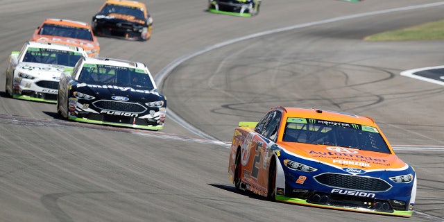 Brad Keselowski (2) drives during a NASCAR Cup Series auto race Sunday, Sept. 16, 2018, in Las Vegas. (AP Photo/Isaac Brekken)