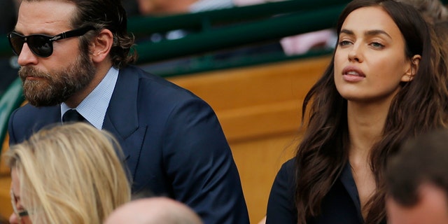 Britain Tennis - Wimbledon - All England Lawn Tennis & Croquet Club, Wimbledon, England - 10/7/16 Actor Bradley Cooper and his girlfriend model Irina Shayk in the royal box on centre court.