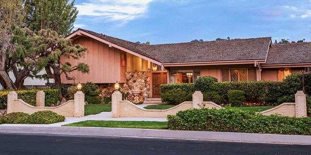 With the exception of a few updates and a gate surrounding the property, the home looks largely the same as "Brady Bunch" fans recall.