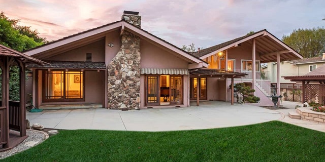 The home boasts a "private and serene" backyard, according its listing at Elliman.com.