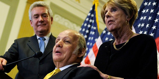 Mar. 30, 2011: James Brady (C), former White House Press Secretary under Ronald Reagan, makes remarks with his wife Sarah Brady (R) during a news conference to urge members of Congress for progress on gun control legislation, specifically passage of a ban on large-capacity ammunition clips, in Washington. (Reuters)