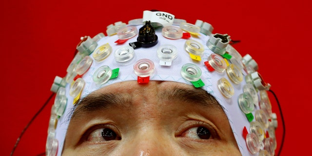 File photo: Hong Gi Kim of South Korea competes during the Brain-Computer Interface Race (BCI) at the Cybathlon Championships in Kloten, Switzerland October 8, 2016. (REUTERS/Arnd Wiegmann)