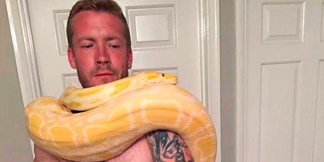 Dan Brandon was found dead on Aug. 25 with his pet python named "Tiny" next to his body.