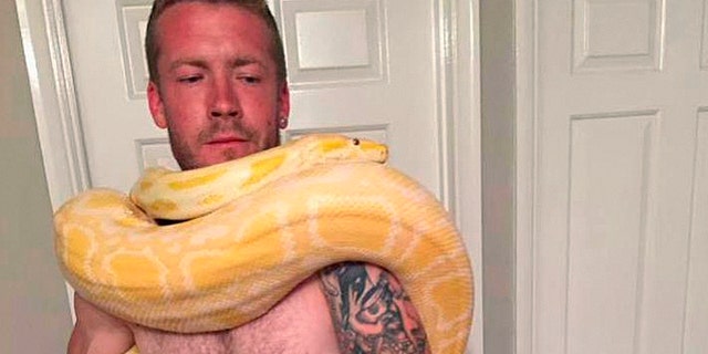 Dan Brandon was found dead on Aug. 25 with his pet python named "Tiny" next to his body.
