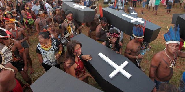 To commemorate the indigenous people killed in recent years, protesters left dozens of coffins in front of the parliament building.