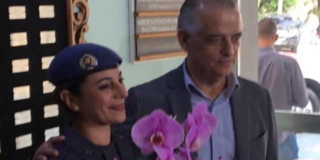 Katia da Silva Sastre with Sao Paulo Gov. Marcio Franca.