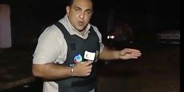 This screenshot from a video posted on YouTube purports to show TV reporter Josenlindo Gonclaves before his TV crew filmed a live shooting.