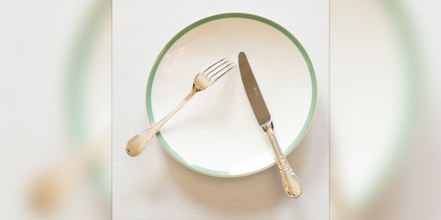 This is the way you leave your cutlery when you are breaking from a meal.