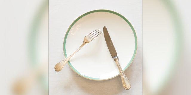 This is the way you leave your cutlery when you are breaking from a meal.