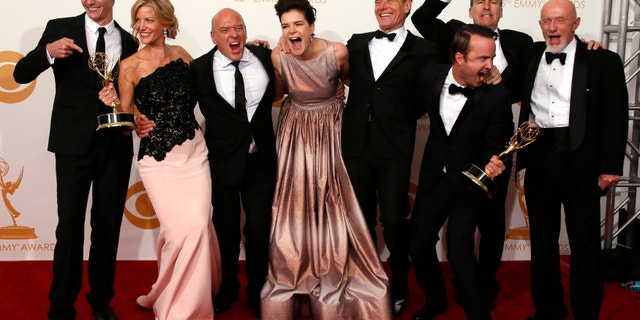The cast from AMC's series "Breaking Bad" poses backstage with their awards for Outstanding Drama Series
at the 65th Primetime Emmy Awards in Los Angeles September 22, 2013.