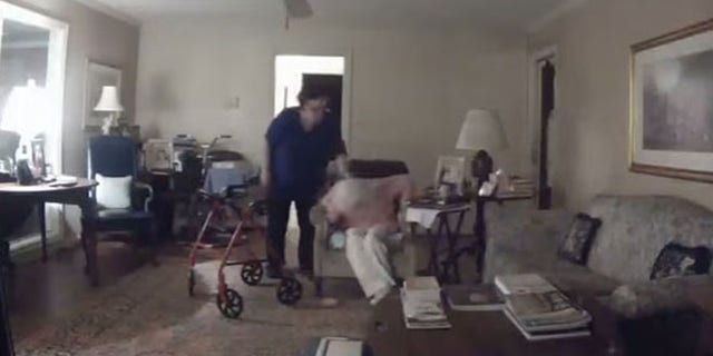 Image from a video that Memorial Villages police say shows caregiver Brenda Floyd striking an elderly woman in her care.