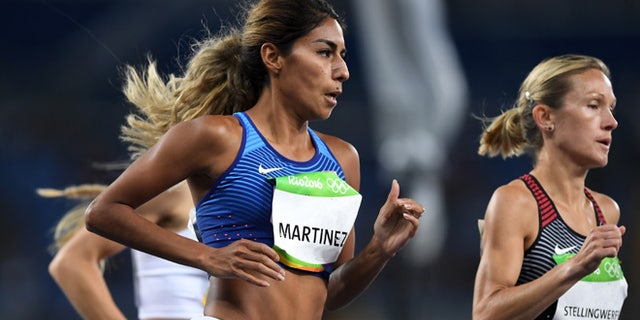 RIO DE JANEIRO, BRAZIL - AUGUST 12: Brenda Martinez of the United States competes in round one of the Women's 1500 metres on Day 7 of the Rio 2016 Olympic Games at the Olympic Stadium on August 12, 2016 in Rio de Janeiro, Brazil. (Photo by Shaun Botterill/Getty Images)