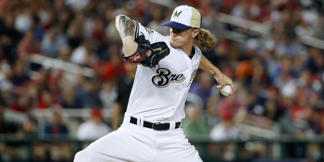 Milwaukee Brewers reliever Josh Hader on Saturday was greeted with a standing ovation by his fans as he emerged for the first time since his homophobic and racist tweets from seven years ago were revealed last week.