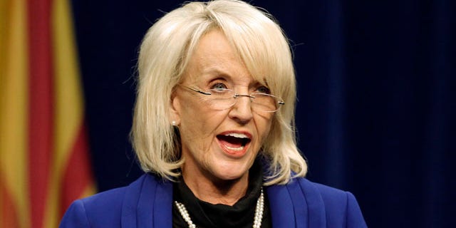 Arizona Gov. Jan Brewer, shown here Jan. 12 on the University of Arizona Campus. (AP)