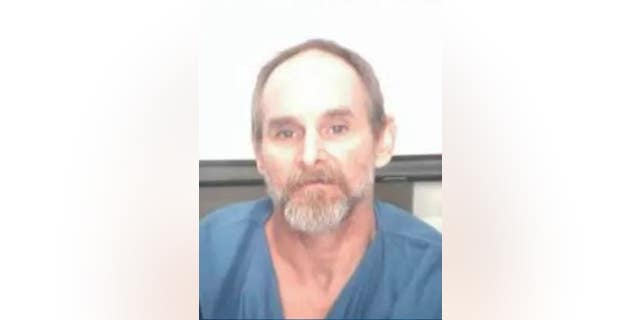 Authorities are searching for Brian Smith, who has been charged with murder, after he was mistakenly released from jail on Tuesday.
