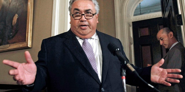 FILE - In this June 10, 2013 file photo, then-California State Sen. Ron Calderon, D-Montebello, discusses the FBI raid on his Capitol office in Sacramento.