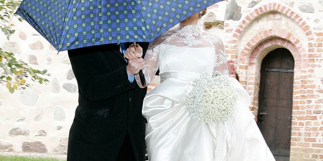 RAMBOW, GERMANY - OCTOBER 03: (EDITORS NOTE: Entertainment Online Subscriptions GLR Included) Barbara Schoeneberger leaves her church wedding with Maximilian von Schierstaedt at the church of Rambow on October 3, 2009 in Rambow, Germany. (Photo by Getty Images)