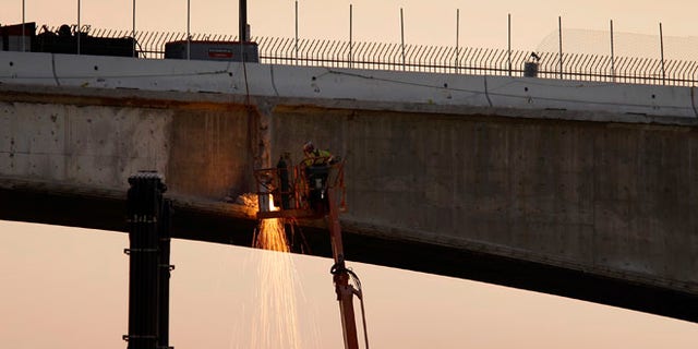 FILE: 2011: The Mulholland Drive bridge, across the 405 freeway, under repair. Los Angeles, Calif.