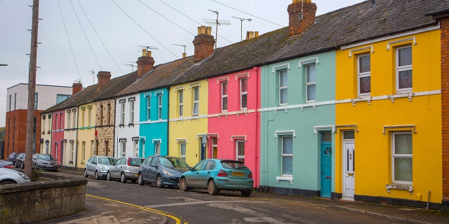 The residents of this neighborhood all painted their homes a different color and said it helped boost their mood.