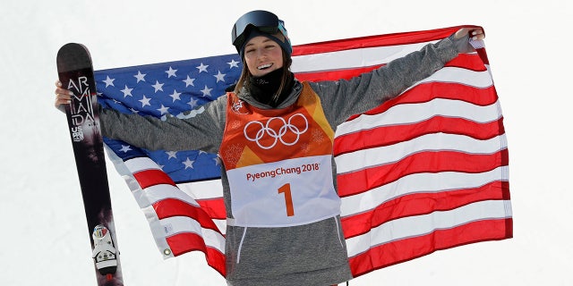 Brita Sigourney celebrates after winning the bronze medal in the women's halfpipe final.
