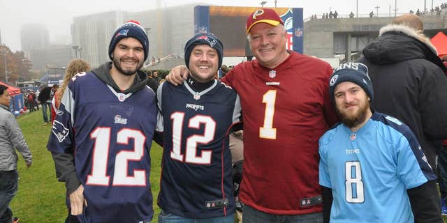 Fans gather before an NFL game in London.