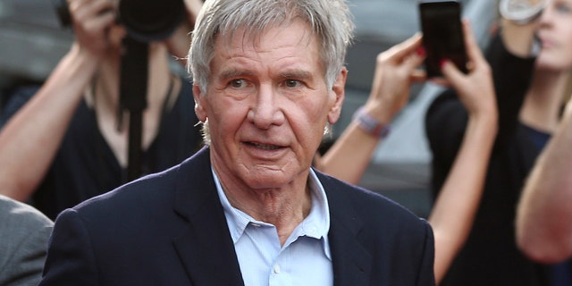 Harrison Ford greets fans during a Star Wars fan event in Sydney. A film production company has been fined 1.6 million pounds ($1.95 million) over an accident on the set of 