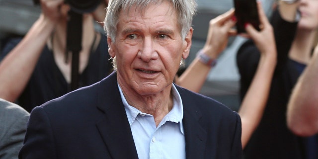 Dec. 10, 2015: Harrison Ford greets fans during a Star Wars fan event in Sydney. A film production company has been fined 1.6 million pounds ($1.95 million) over an accident on the set of "Star Wars: The Force Awakens" that broke the leg of star Harrison Ford.