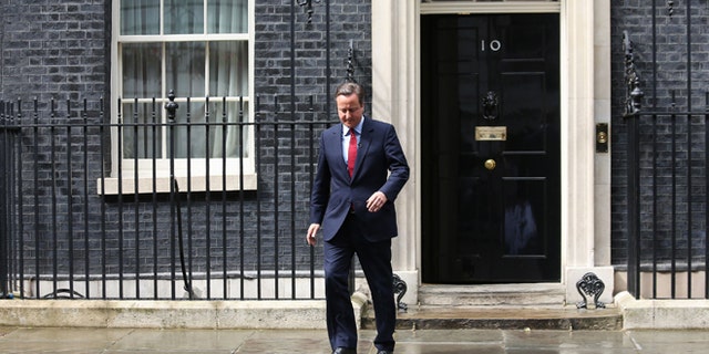 July 11: Britain’s PM David Cameron walks outside No. 10 Downing Street.