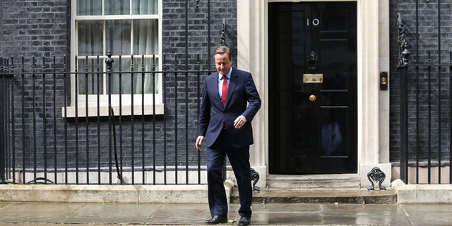 July 11: Britain’s PM David Cameron walks outside No. 10 Downing Street.