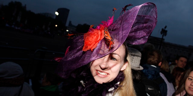 April 29: Christine Peckham from London wears a fancy hat along the Royal Wedding route in London on Friday. (AP)