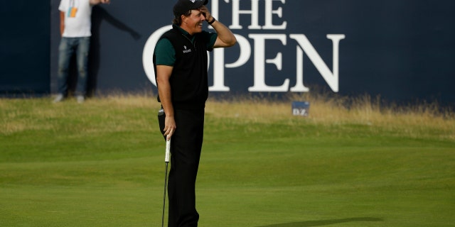 July 14, 2016: Phil Mickelson reacts as he narrowly misses a birdie putt on the 18th green during the first round of the British Open Golf Championships at the Royal Troon Golf Club in Troon, Scotland.