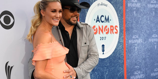 Jason Aldean and his wife Brittany arrive at the 11th Annual ACM Honors in Nashville, Tennessee.