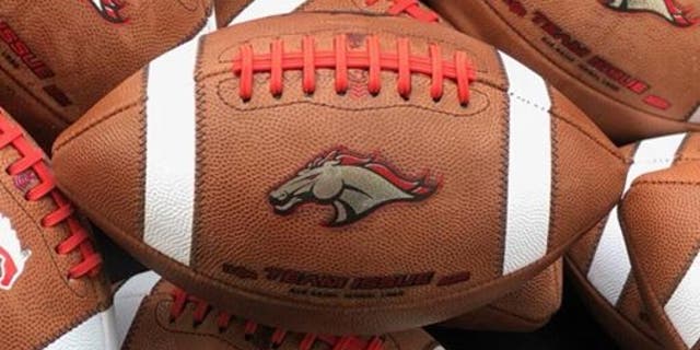 The logo of Brophy Prep's Broncos is seen on game footballs.
