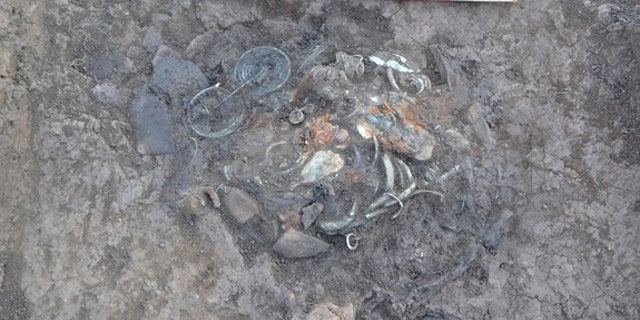 Two hoards (one of which is shown here), dating back to the eighth century B.C., may have been offerings to deities, scientists say.