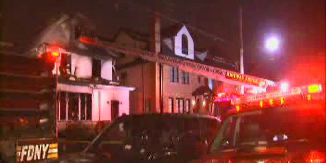 Fire broke out at the Brooklyn home about 2:15 a.m., leaving most of the building "heavily damaged," officials said.