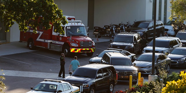 Police and rescue vehicles are shown outside Broward Health North hospital, Wednesday, Feb. 14, 2018, in Deerfield Beach, Fla.