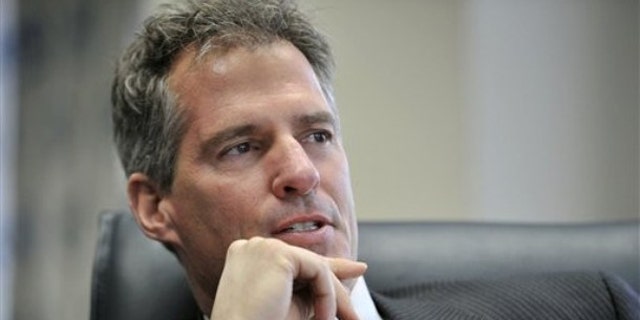 In this Jan. 11 photo, Sen. Scott Brown answers a question during an interview at his office in Boston.
