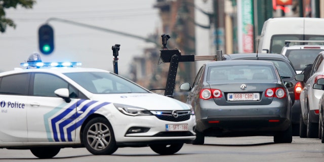 A bomb disposal squad is deployed after Belgian police shot at a vehicle in the Brussels district of Molenbeek after the driver of the vehicle claimed to have explosives on board, Belgian broadcaster VRT reported on Tuesday.