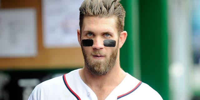 WASHINGTON, DC - JUNE 02: Bryce Harper #34 of the Washington Nationals watches the game against the Toronto Blue Jays at Nationals Park on June 2, 2015 in Washington, DC. (Photo by G Fiume/Getty Images)