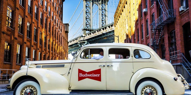 In honor of their new offering, Budweiser is partnering with Lyft to give New Yorkers the chance to ride in a Prohibition-era car.