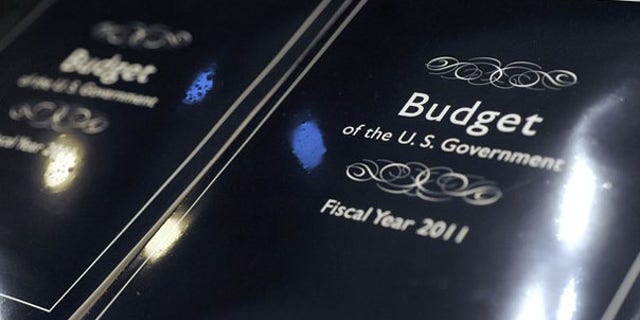 The cover of President Obama's 2011 budget is seen as copies are unpacked for distribution to Senate staff on Capitol Hill Feb. 1.
