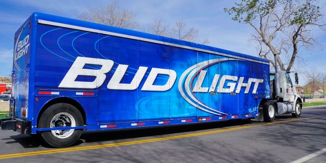 A Bud Light truck flipped over and spilled its contents on an Arizona roadway.